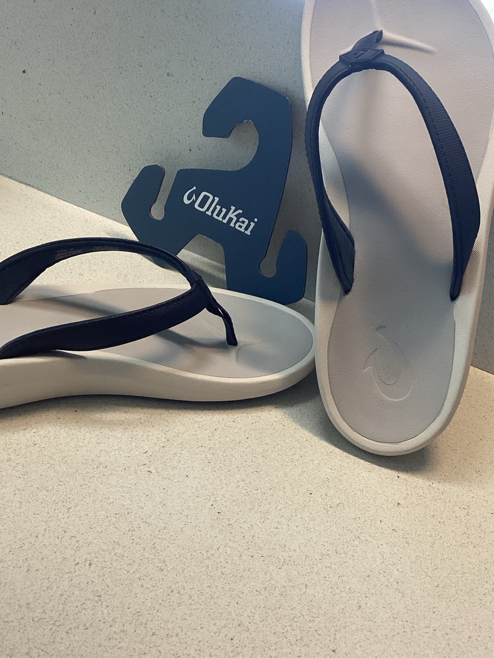 OluKai Women's Light Gray Footbed with Navy Straps Flip Sandals